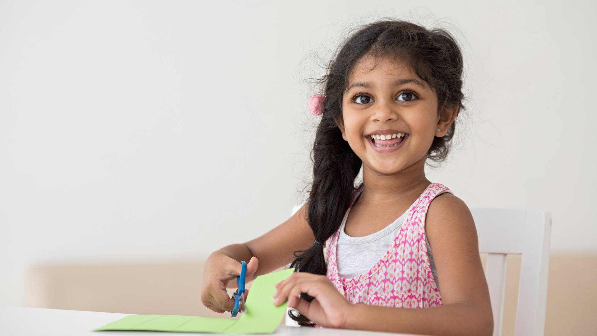 Hero Smile Girl Cutting Paper